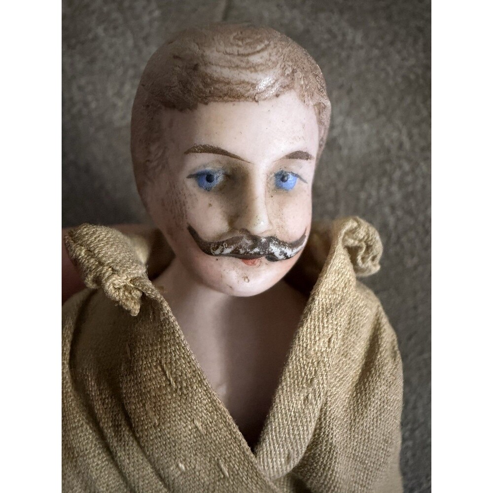 Antique German bisque gentleman doll, approximately 7 inches tall,